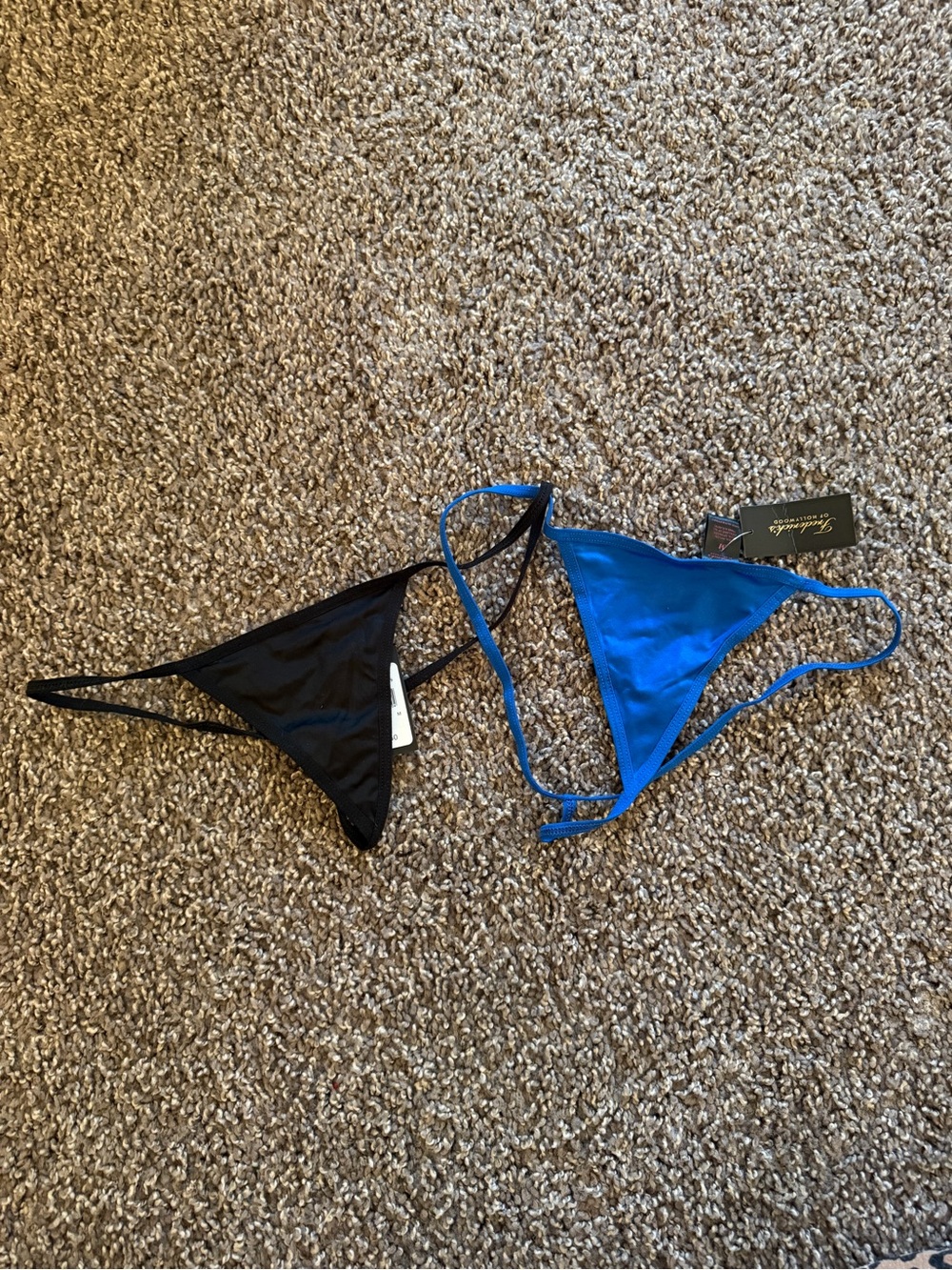 Two Frederick’s of Hollywood micro thongs